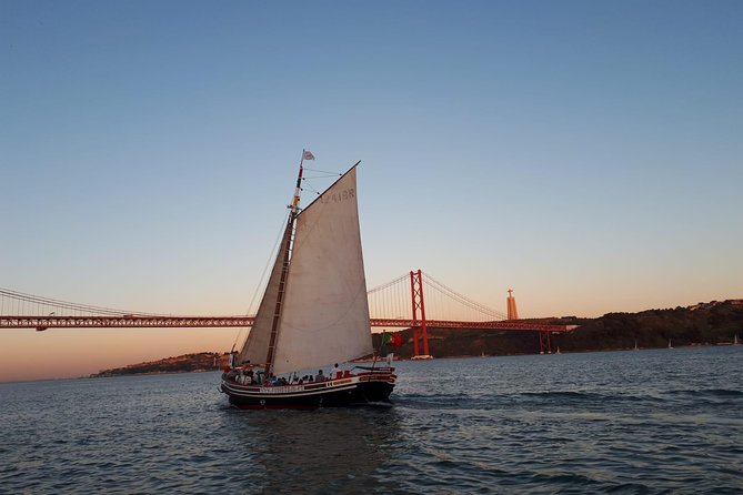 2-Hour Lisbon Traditional Boats Sunset Cruise with White Wine - Meeting Near Praça do Comércio, Then Picking the Best Spot