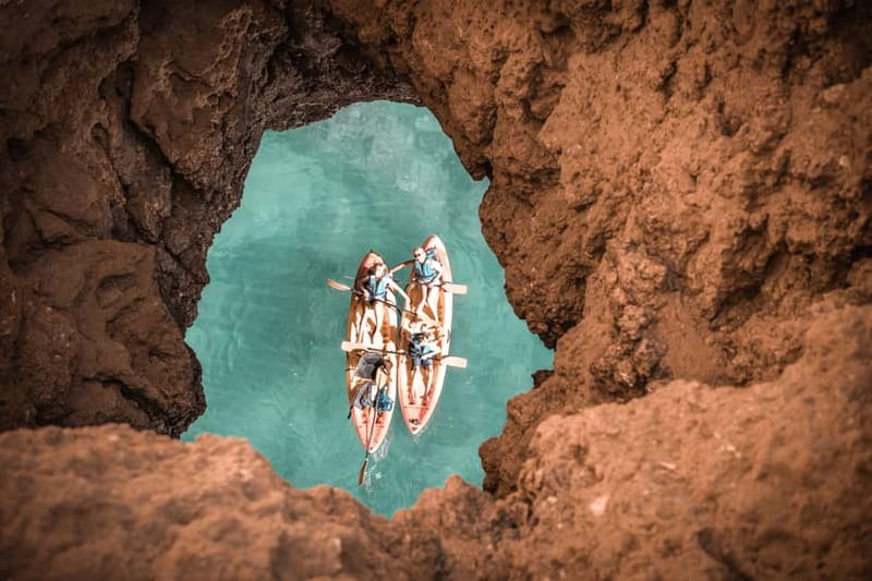 Albufeira: Hidden Beaches & Cliffs Guided Kayak Cave Tour - Praia da Coelha: the coastline teaches you the paddle rhythm fast