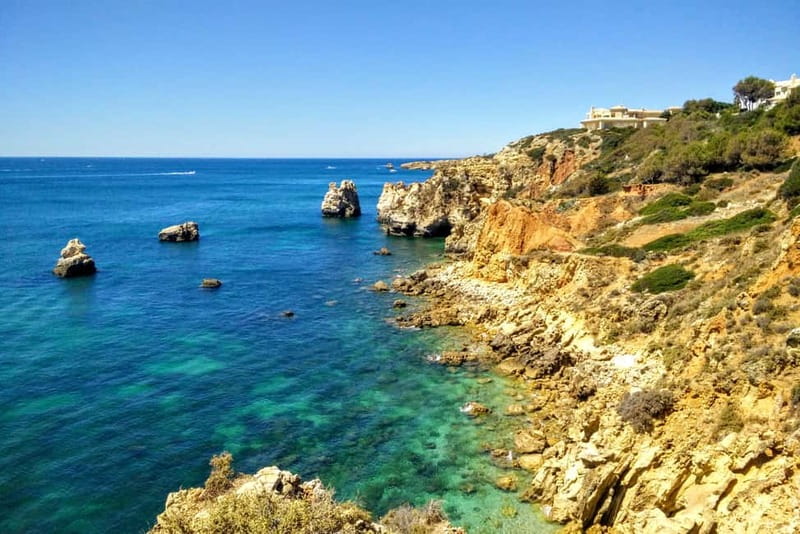 Albufeira: Tuk Tuk Ride with Old Town and Beaches - Baleeira cliffs and the lighthouse panorama up to 50 km