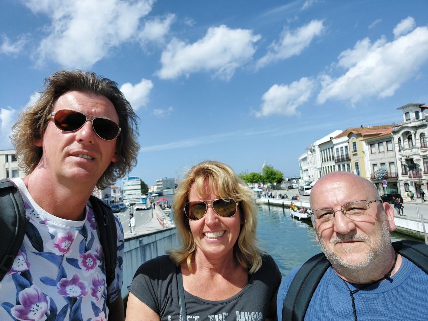Aveiro: Stories, Canals, and Tiles Guided Walking Tour - Rua de Coimbra, black-and-white calçada, and the Mercy Church entrance