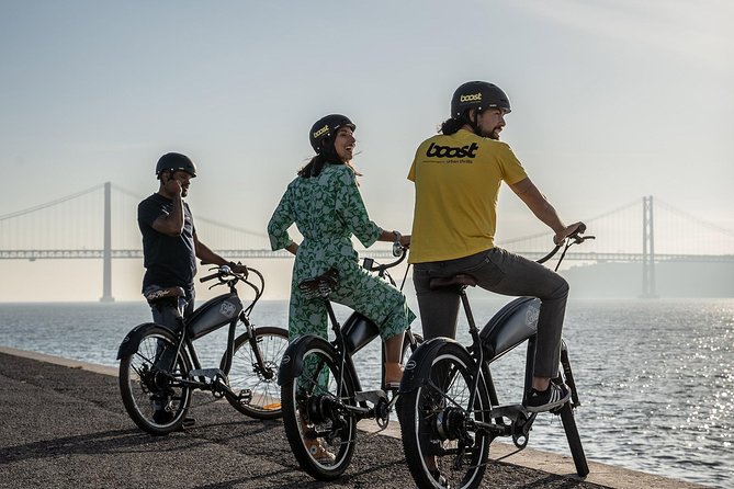 Belém E-Bike Guided Tour Explore Lisbon by the river - Passing the 25th of April Bridge and stopping by the docks