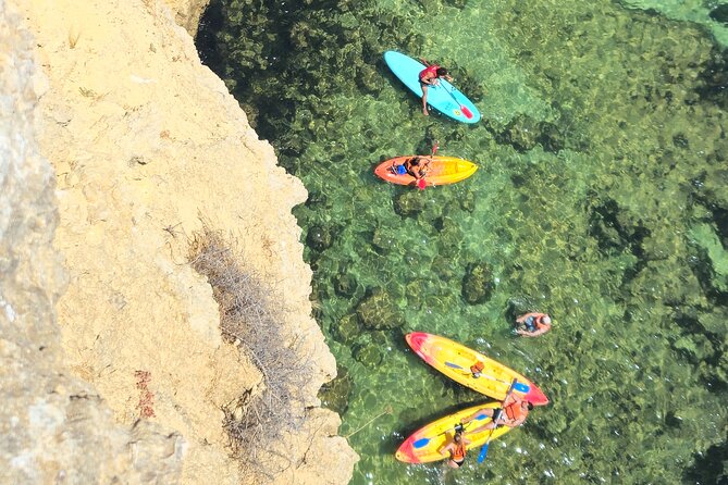 Benagil: Caves, Beaches, and Secret Spots Guided Kayak Tour - The swim stop: cool water, clear views, and what to plan for