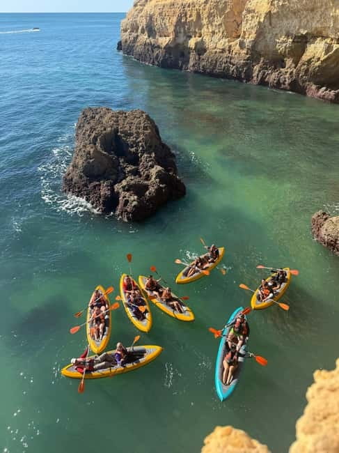 Benagil: Guided Kayak Tour inside caves and Praia da Marinha - Paddling through Benagil: calm cruising plus real coastal views