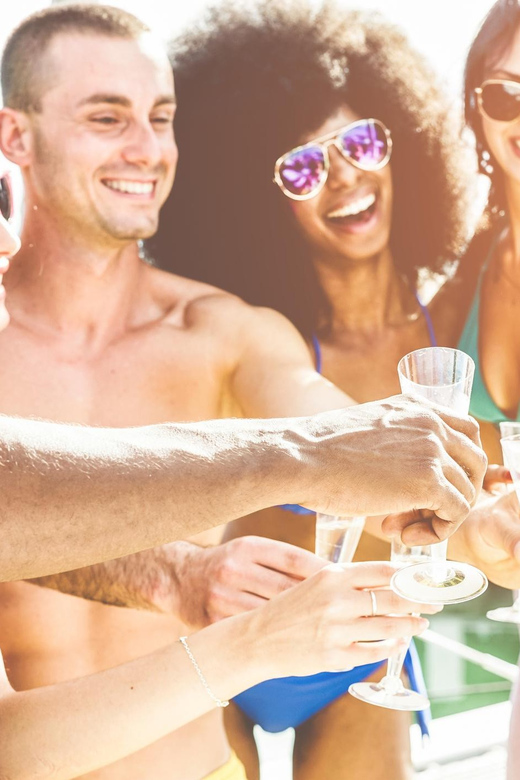Boat Party to the Beach with Swimming Stops, DJ and Open Bar - Included Extras That Matter More Than You Think