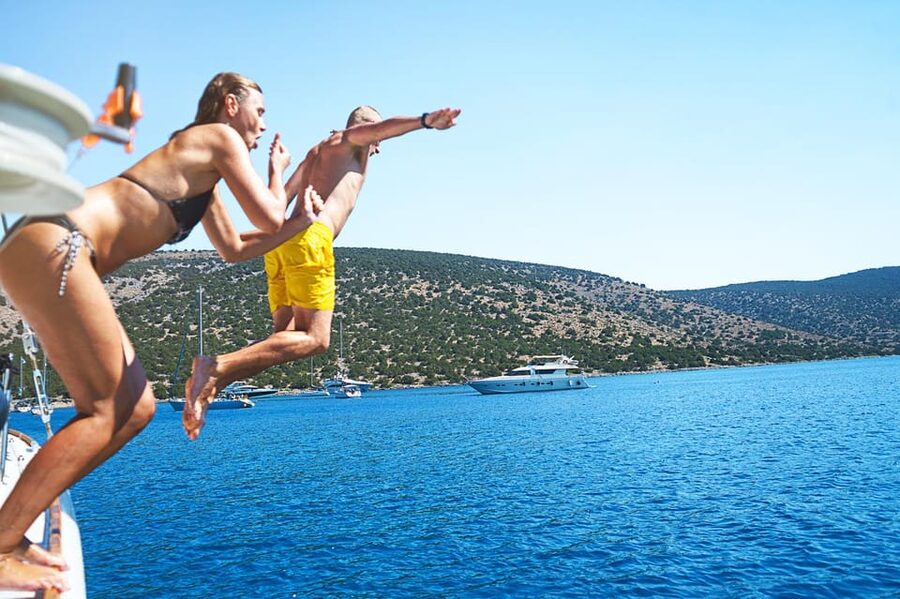 Boat Party to the Beach with Swimming Stops, DJ and Open Bar - Getting Maximum Value for $41 Per Person