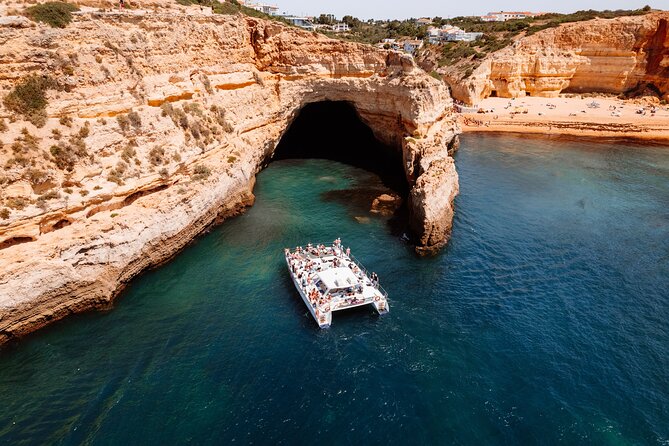 Catamaran Cruise: Caves and Coastline to Benagil - Onboard vibe: Wi-Fi, music, and live commentary that actually helps