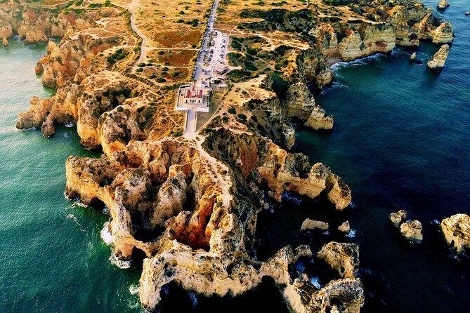 Coastal Tour 2H30M / Lagos / Grottos / Aqua Trampoline - Ponta da Piedade Stop: Caves by Small Boat plus Swim Time