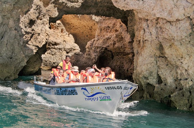 Coastal Tour 2H30M / Lagos / Grottos / Aqua Trampoline - Onboard Comfort: Shade, Restroom, Music, and Where to Spend Your Time