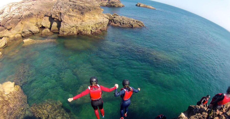 Coasteering Algarve: Cliff Jump, Swim & Climb in Sagres - Gear up: wetsuit, buoyancy aid, helmet, and shoes that actually help