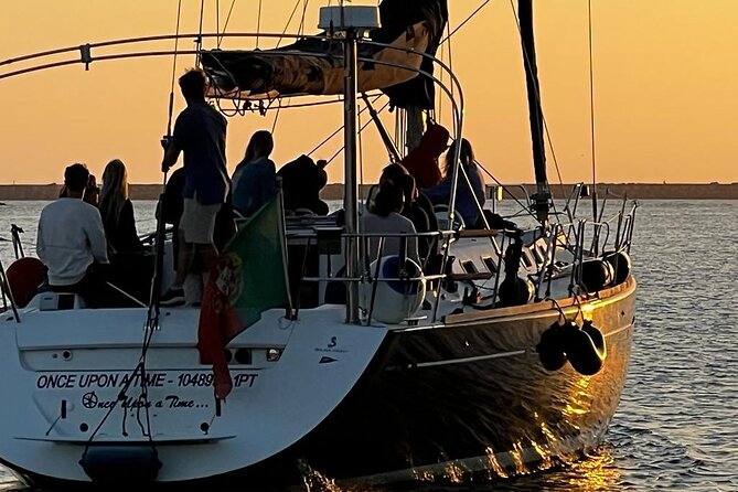 Douro Sunset Sailboat Experience in Porto - Drinks, snacks, and staying comfortable as the breeze hits