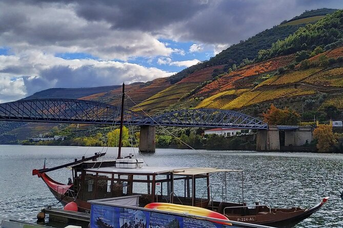 Douro Valley Prime Tour: Wine Tastings, Boat & Lunch from Porto - Crossing into Douro country: Peso da Regua bridge and tributary views