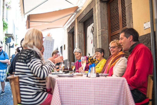 Eating Madeira! Wine & Food Tour in Funchal - Sweet stops for chocolate, biscuits, and Madeira cakes