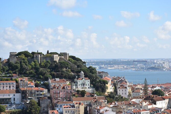 Expert Lisbon Tour with Local Guide in Private Eco Tuk Tuk - Chiado and Bairro Alto: elegant streets, the old bookstore, and cobblestone nightlife