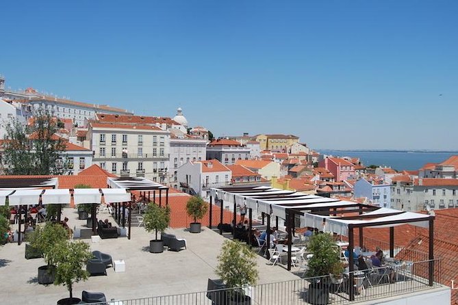 Expert Lisbon Tour with Local Guide in Private Eco Tuk Tuk - Alfama and Sé de Lisboa: cathedral roots, fado streets, and killer views