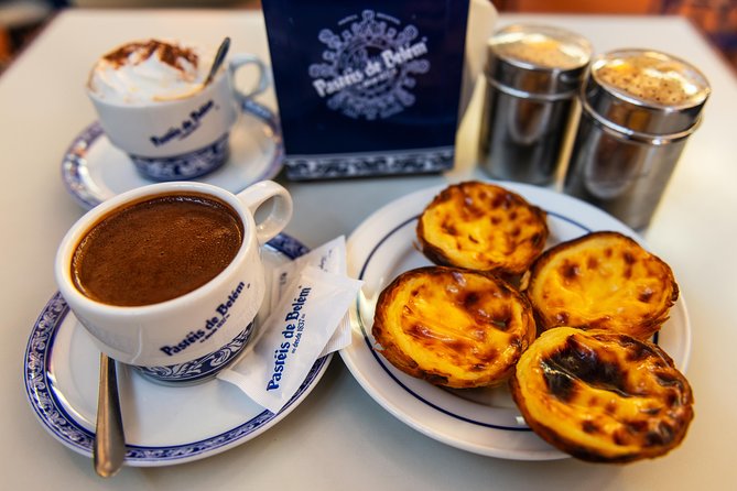 Explore Lisbon City on a private half-day tour in a van - Belém in one smooth arc: pastries, Jerónimos, Tower views, and explorers