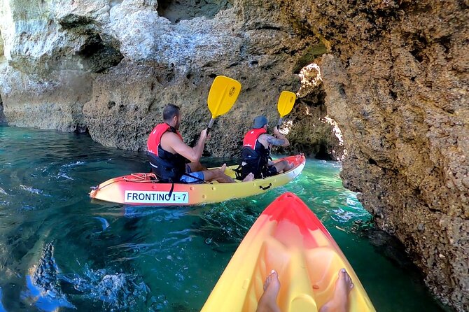 Explore Secret Caves and Beaches of Alvor - Boat & Kayak Tour - João de Arens: kayaking the secret-feeling caves, then a swim