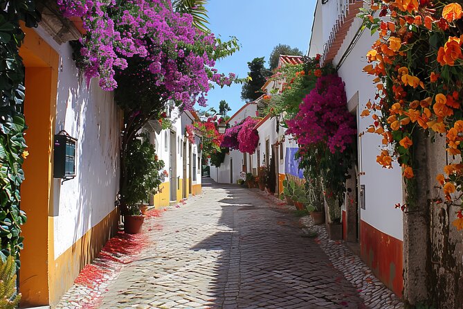 Fatima, Batalha, Nazare, Obidos Small Group Tour From Lisbon - Nazaré cliffs and viewpoint stops: how to get the Atlantic drama