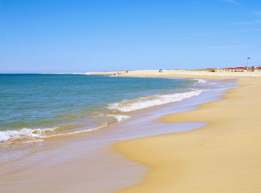 From Faro: 4 Stops, 3 Islands in Ria Formosa Catamaran Tour - Walking, swimming, and the real time math of a half-day tour