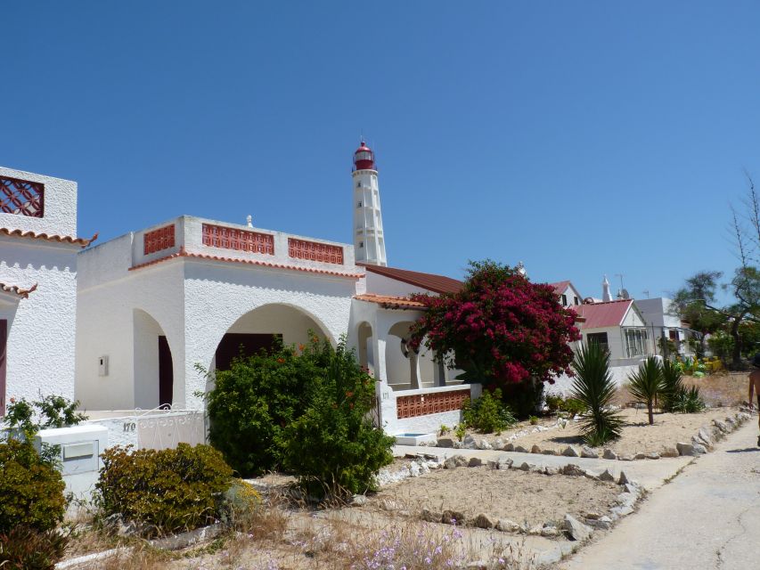 From Faro: 4 Stops, 3 Islands in Ria Formosa Catamaran Tour - Stop 2, Ilha do Farol: lighthouse views and classic Algarve houses