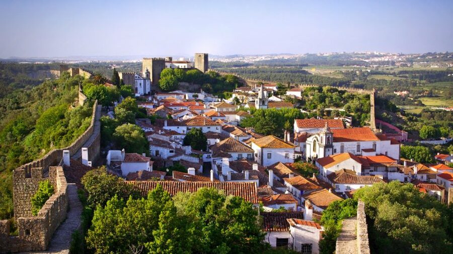 From Lisbon: Fátima, Batalha, Nazaré & Óbidos Full-Day Tour - Óbidos Walls, Whitewashed Lanes, and the Ginjinha Finale