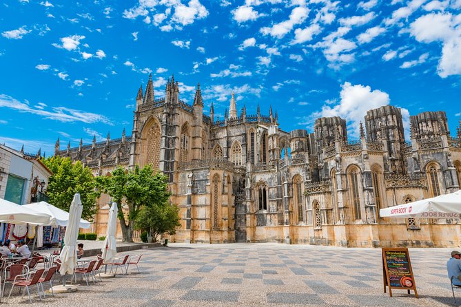 From Lisbon: Fatima Batalha Nazare & Obidos Small Group Day Trip - Óbidos village in about an hour: cobbles, fortifications, and castle views