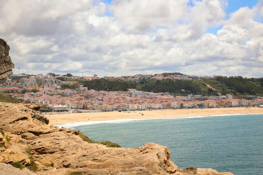 From Lisbon: Fátima, Óbidos, and Nazaré Small Group Day Tour - Nazaré cliffs and surf views over the Atlantic