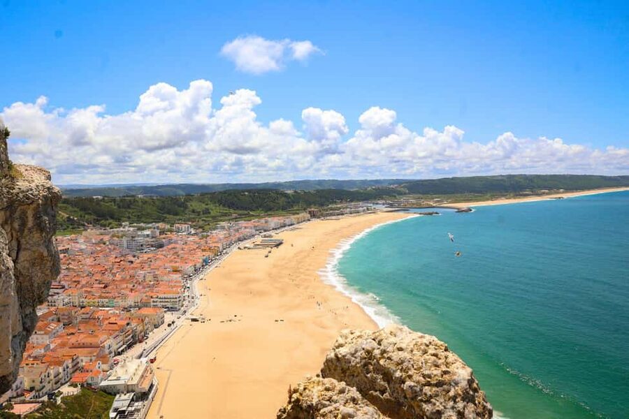 From Lisbon: Fátima, Óbidos, and Nazaré Small Group Day Tour - Guides, language options, and what to expect from the narration