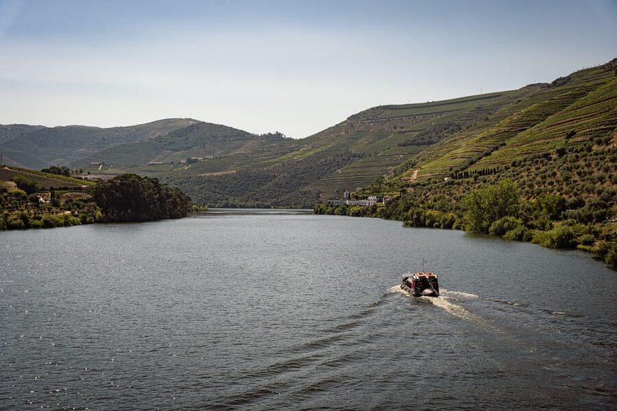 From Pinhão: Douro Valley Rabelo Boat Tour with Port Wine - A Rabelo boat from Pinhão, aimed at the Tua area