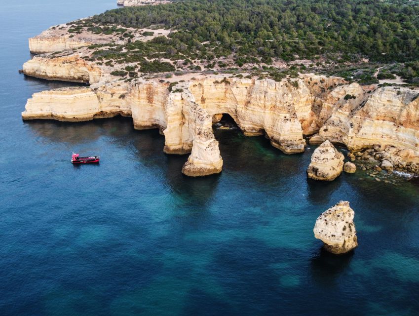 From Portimão: 2-Hour Catamaran Tour to Benagil Caves - Praia da Marinha swim stop: a short break that changes the whole tour