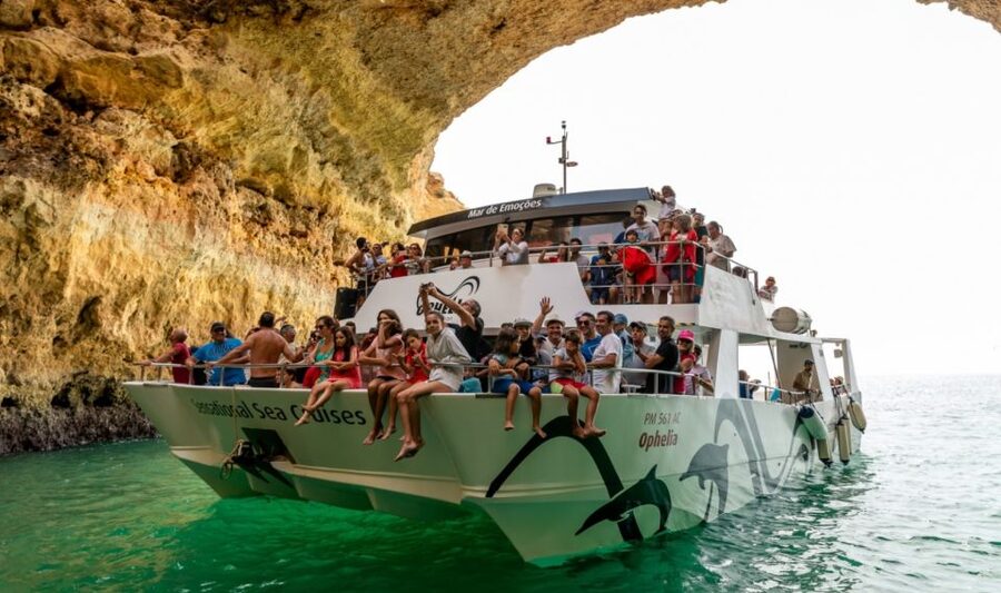 From Portimão: Catamaran Cruise to Benagil Caves with BBQ - The beach BBQ stop near Benagil: food, shade, and ocean time