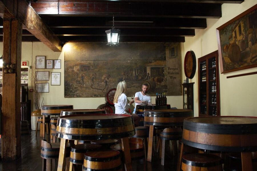 Funchal: H.M. Borges Winery Guided Tour with Wine Tasting - Entering the H.M. Borges Winery in Funchal: quick orientation, central stop