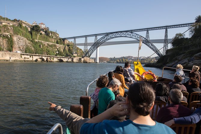 Half Day City Tour with Six Bridges Cruise and Wine Tasting - Coach sightseeing: Avenida dos Aliados, the city center, and Lello Bookshop