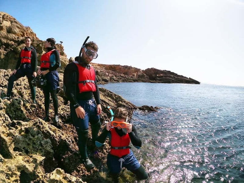 Lagos: Algarve Coasteering and Snorkeling Adventure - Gear and safety on the rocks: wetsuit, helmet, buoyancy aid, and lifeguard-certified guidance