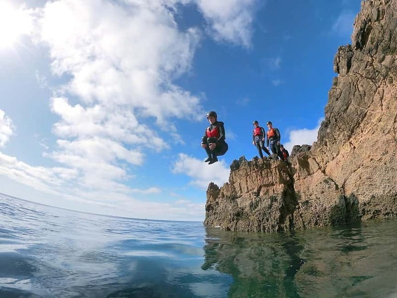 Lagos: Algarve Coasteering and Snorkeling Adventure - The guided itinerary flow: hiking a little, swimming a little, then doing it again