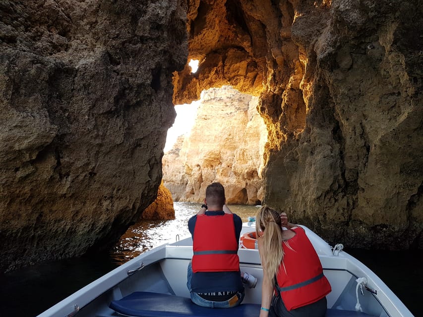Lagos: Ponta da Piedade Grotto 1-Hour Tour with Local Guide - Entering the caves: Cathedral, Kitchen, Garage, Living Room