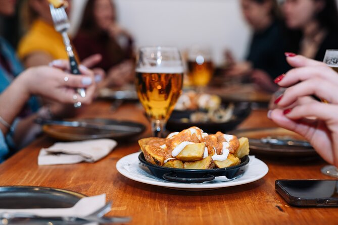 Lisbon: Award-Winning Guided Walking Food Tour with Local Drinks - Stop 6 at Praça dos Restauradores: pastel de nata to close the loop
