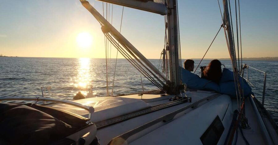 Lisbon: City Skyline Sailboat Cruise with Drink and Snacks - Group size and vibe: intimate enough to talk, big enough for company