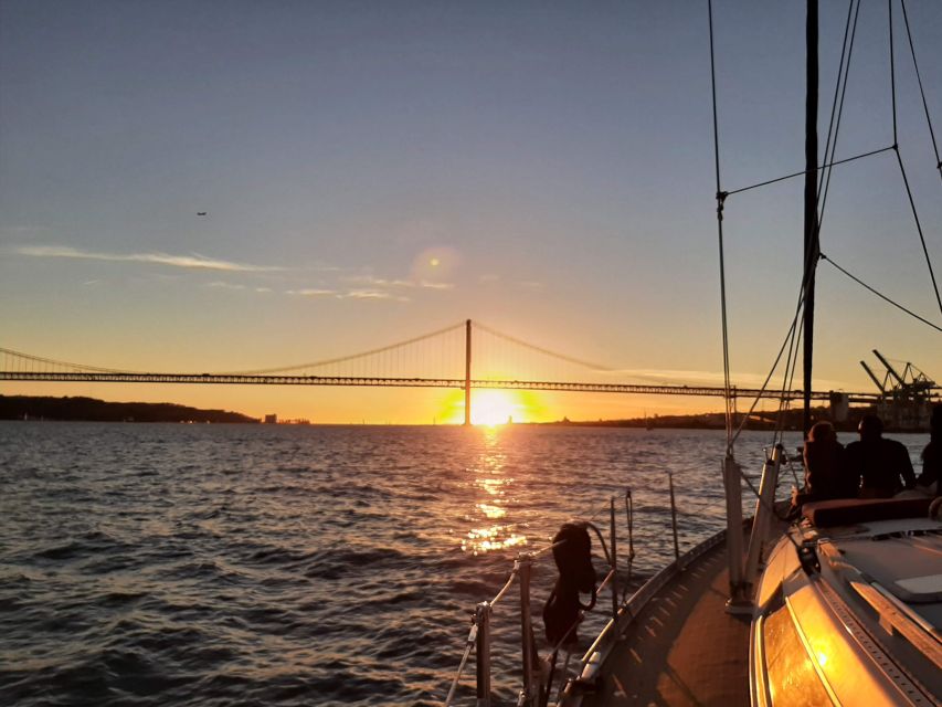 Lisbon: City Skyline Sailboat Cruise with Drink and Snacks - Meeting at Santo Amaro Dock, under the 25th April Bridge