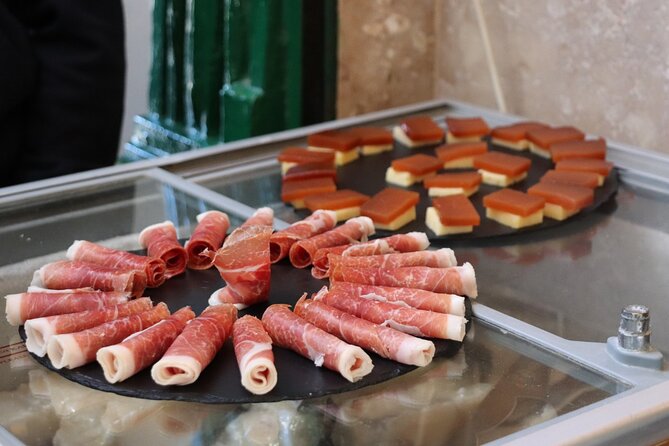 Lisbon Cultural Food and Wine Walking Tour - The 14 tastings: codfish cake, green wine, bifana, ginjinha, and the rest
