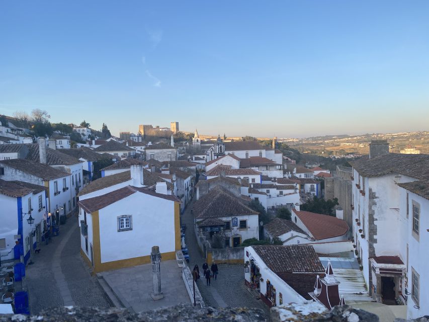 Lisbon: Fátima, Batalha, Nazaré & Obidos Small-Group Tour - Óbidos Castle Walk: Medieval Streets, Castle Views, and Sour Cherry Liquor