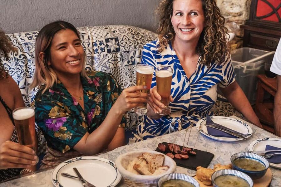 Lisbon: Food & Wine Walking Tour Through Baixa - Bifana, seafood staples, and the dessert you close with