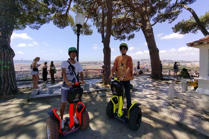 Lisbon Highlights Guided Segway Tour - Largo do Carmo Under Jacaranda Trees and the Ruins Nearby