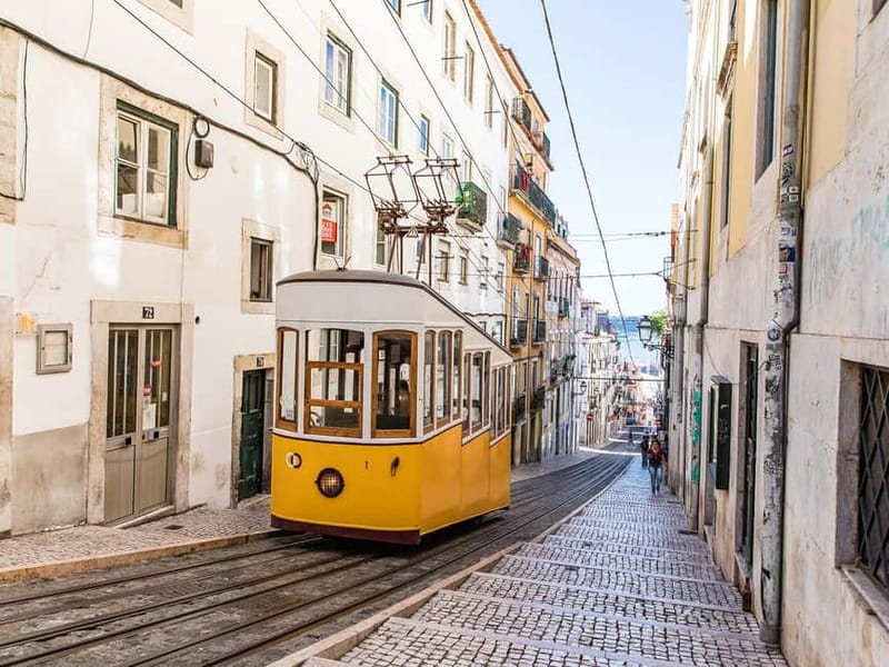 Lisbon: Private Guided Tour by Electric Tuk Tuk - Rolling Into Lisbon from Rossio and the Cathedral Area