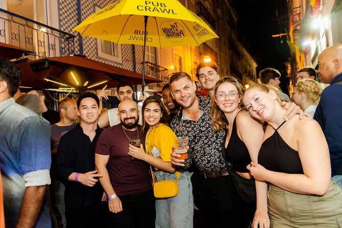 Lisbon: Pub Crawl with Open Bar, Shots & VIP Club Entry - Stop 1: the welcome shot and group momentum