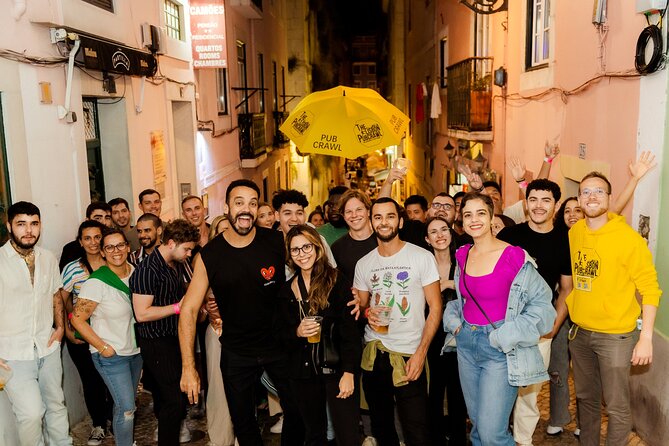 Lisbon: Pub Crawl with Open Bar, Shots & VIP Club Entry - Bairro Alto, Pink Street, and Cais do Sodré after sunset