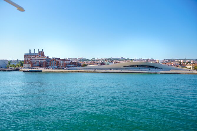 Lisbon River Boat Sightseeing Tour with a Drink - MAAT and Tejo Power Station: art meets industrial Portugal