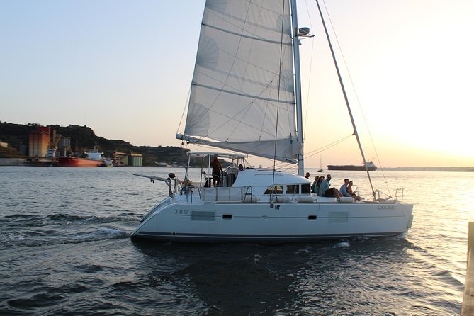 Lisbon Sailing Catamaran Public Cruise with drinks - Where to meet: Blue Skipper, Doca de Alcântara Norte, Gate 3