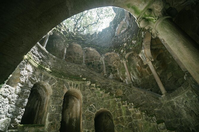 Lisbon: Sintra Half-Day Guided Tour with Pena Palace Tickets - National Palace exterior stop: the chimneys trick