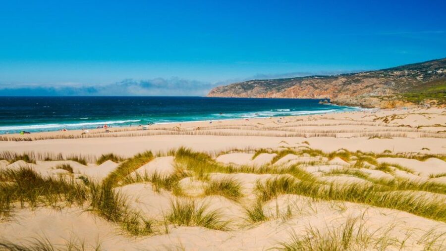 Lisbon: Sintra, Pena, Regaleira, Cabo Roca Coast & Cascais - Cabo da Roca cliffs and Guincho Beach: short stops, big photo payoff