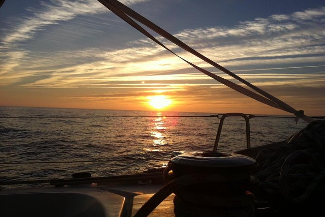 Lisbon Small Group Sunset Sailing 2h Cruise with Drinks Included - Drinks onboard: how the included wine and beer change the mood